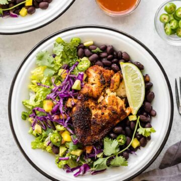 Stove Top Blackened Tilapia recipe, Cajun style, perfect for fish tacos or burrito bowl. Tilapia fillets, marinated in homemade blackened fish seasoning, then cooked in a heavy cast-iron pan.