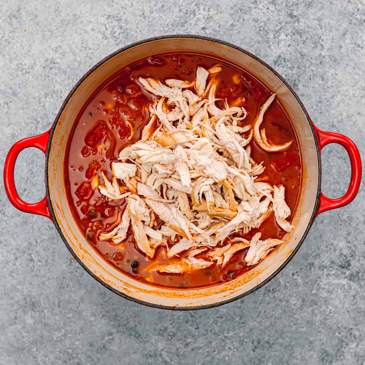 shredded chicken in a soup.