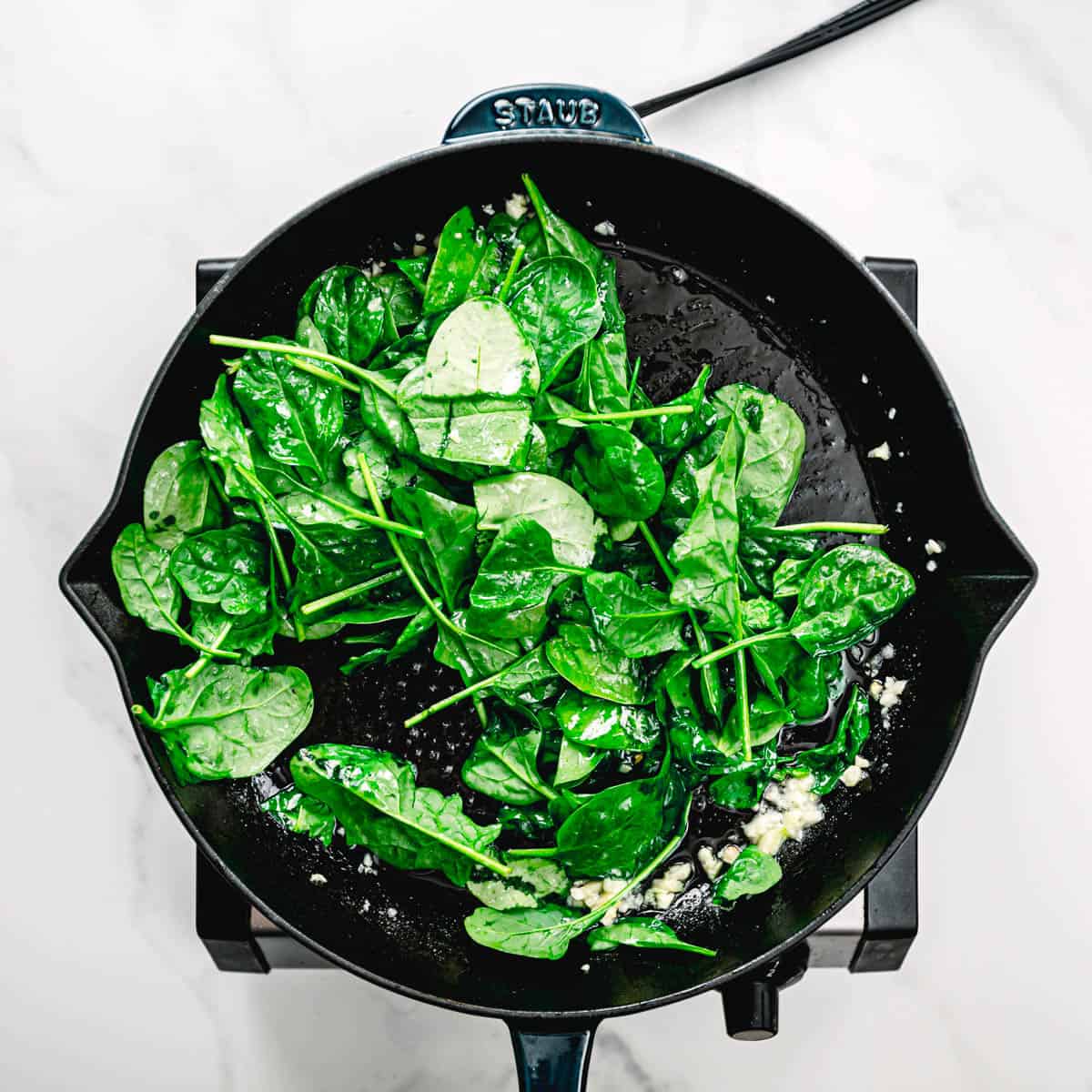 Add spinach and stir for about 30-40 seconds. Do not overcook. 