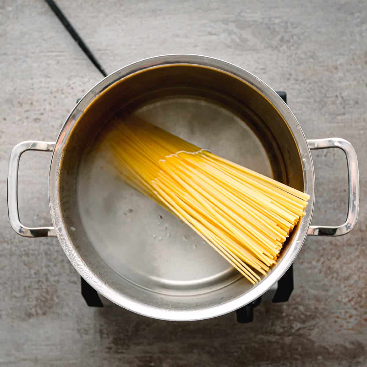 boiling pasta in salted water. 