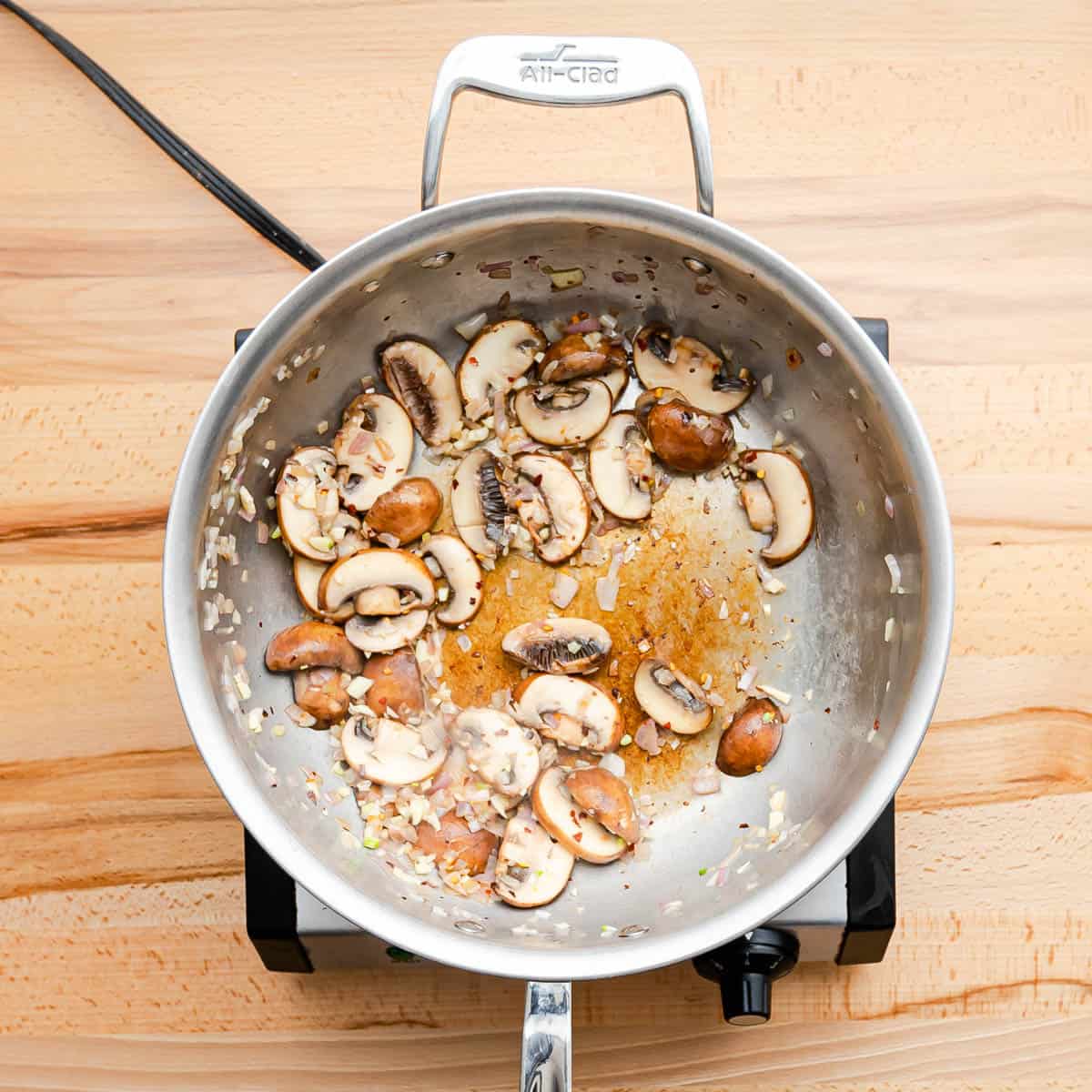 Cook shallots and mushrooms for 5 minutes. 