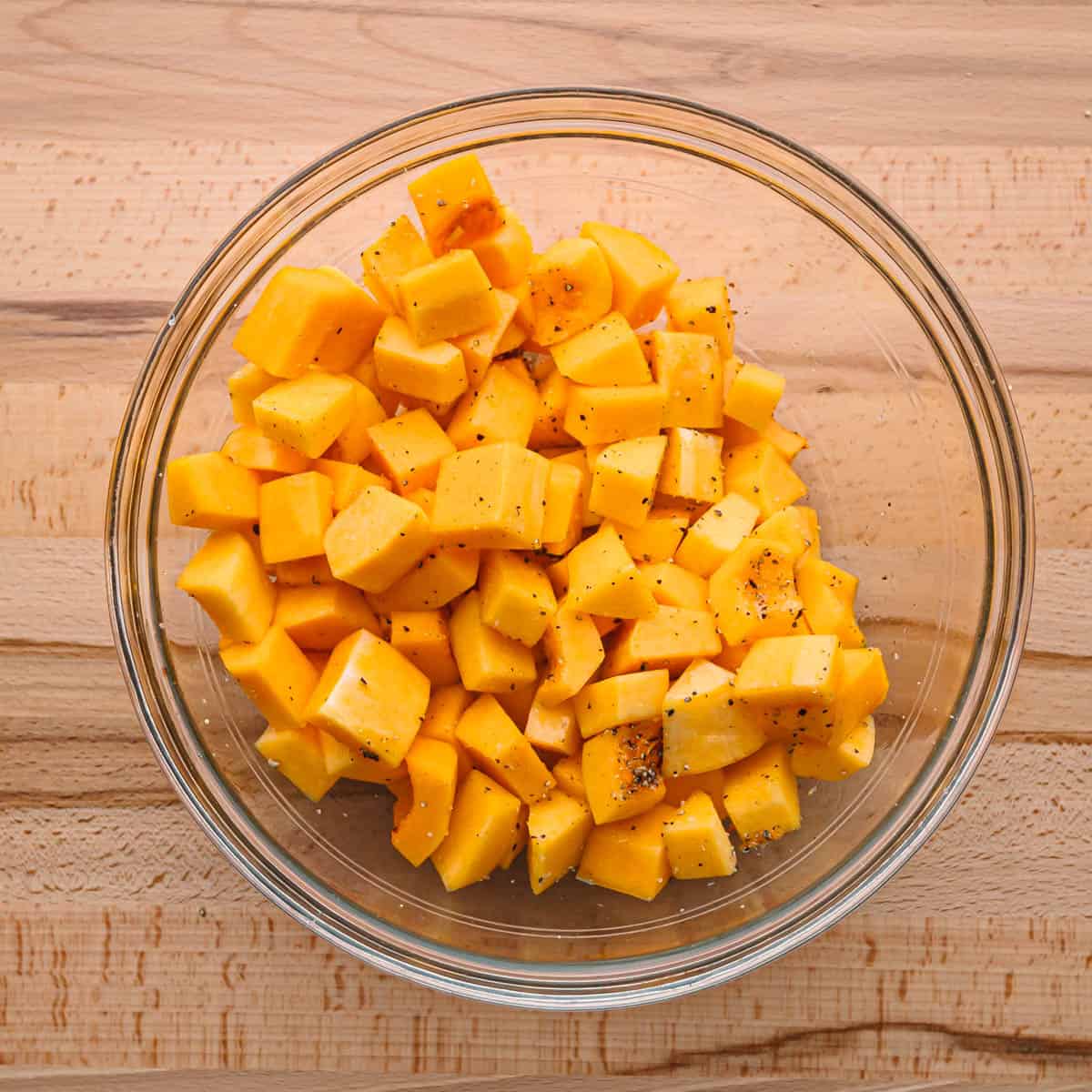 4. Season the Butternut Squash. Use clean hands or kitchen tongs to mix everything together, making sure the butternut squash gets seasoned on all sides.