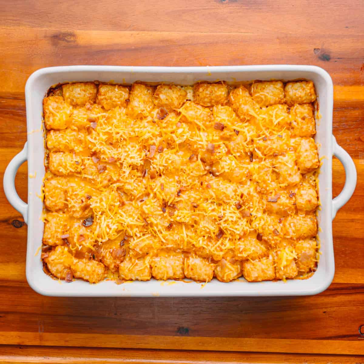 cheesy tater tots on a baking dish. 