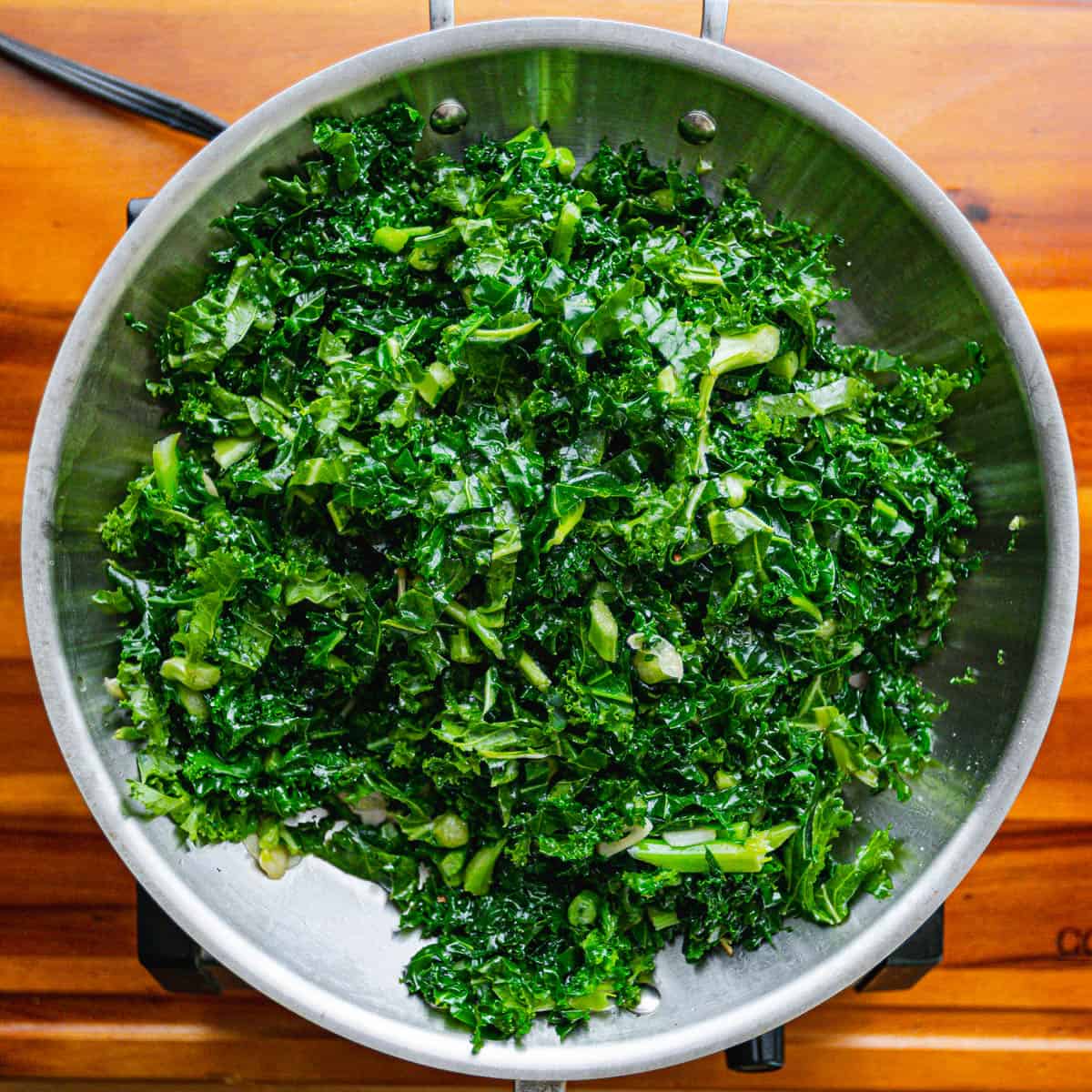 tir well, incorporating more kale and broth as needed, until the kale becomes moist and tender. Optionally, sprinkle a pinch of kosher salt and black pepper to elevate the taste.