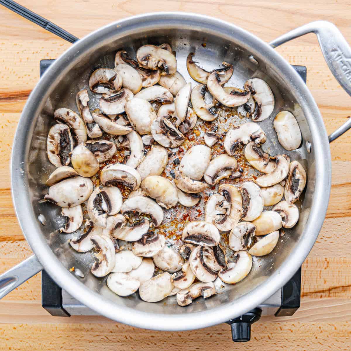 Cook the mushrooms until browned, about 3 minutes. Set them aside.