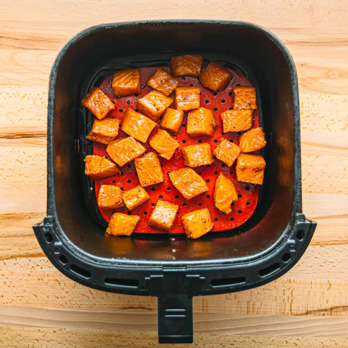 salmon bites in an air fryer. 