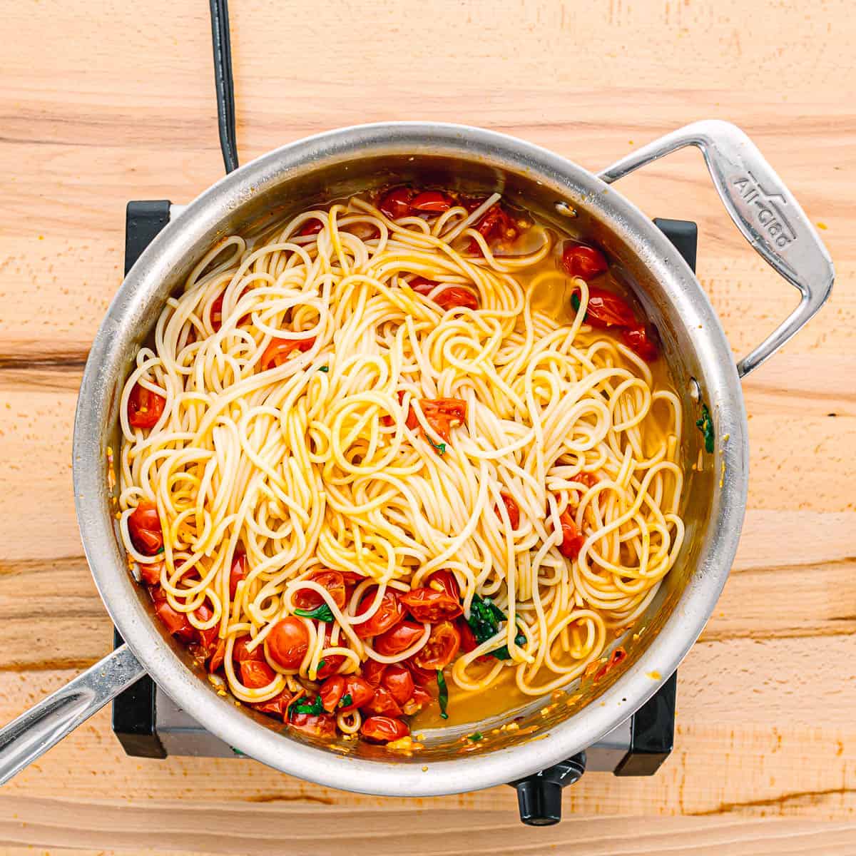 Taste the pasta and adjust the seasoning with additional salt and black pepper if needed. Serve immediately and enjoy your flavorful pasta with tomatoes!