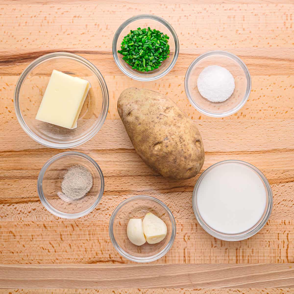 russet potatoes, butter, milk, garlic, white pepper, salt. 