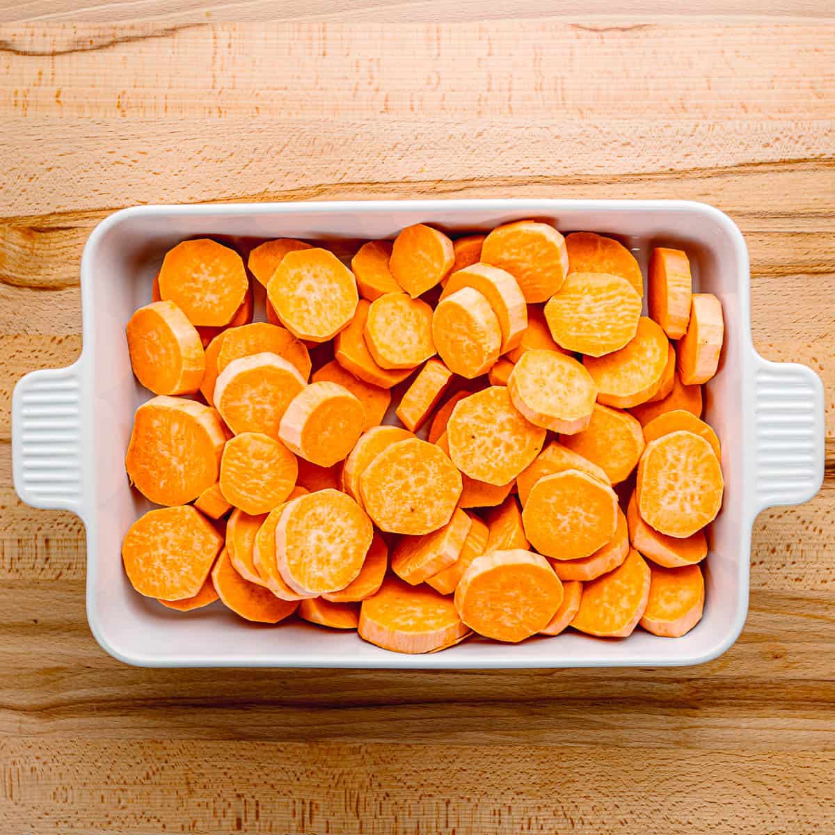 Peel and cut sweet potatoes.