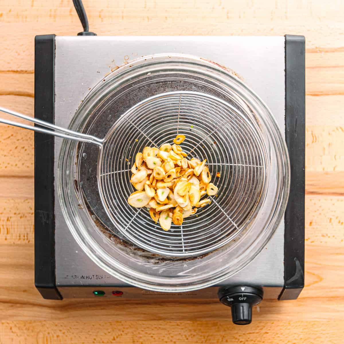 sautéing sliced garlic. 