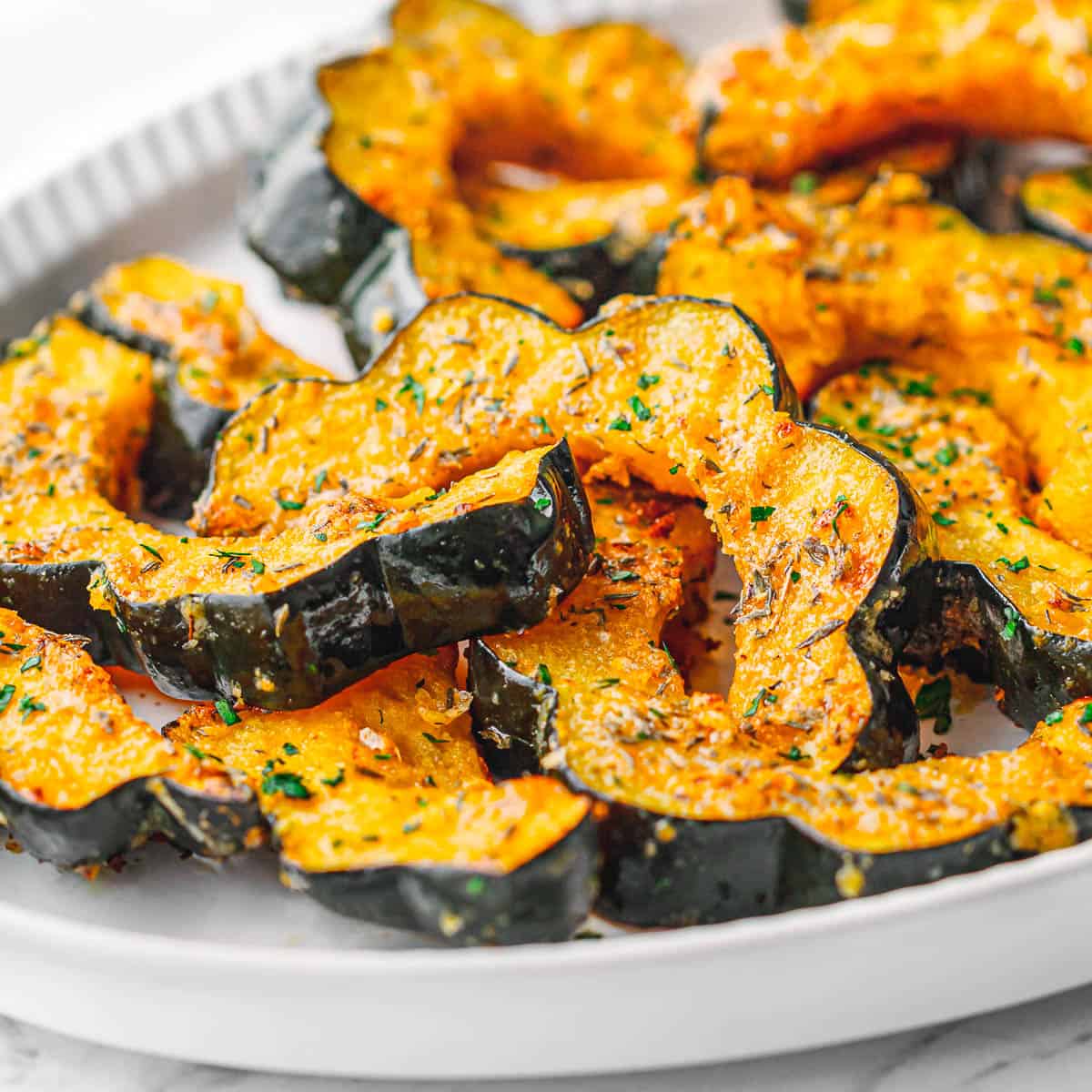 roasted acorn squash with parmesan and herbs.