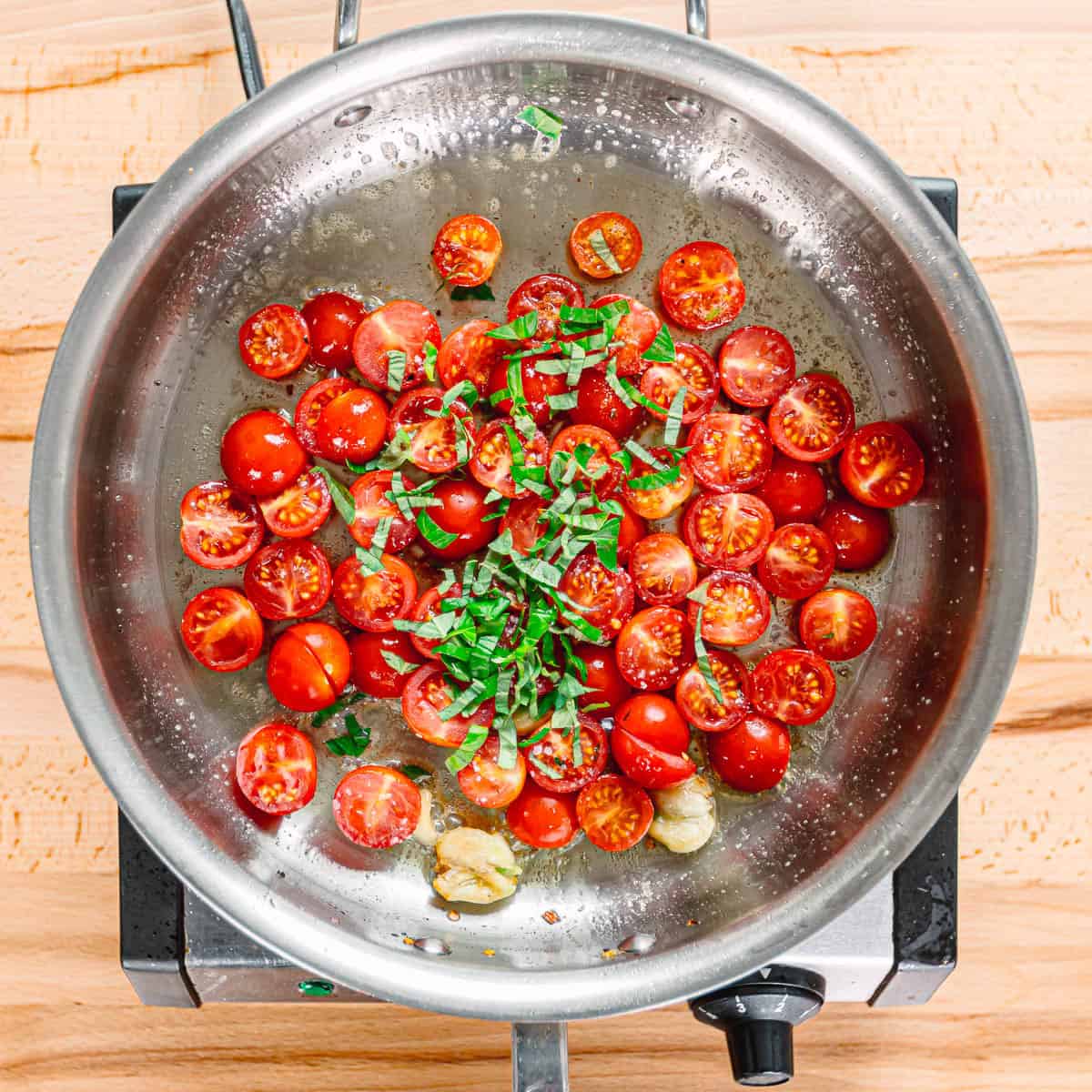 cooking cherry tomatoes.