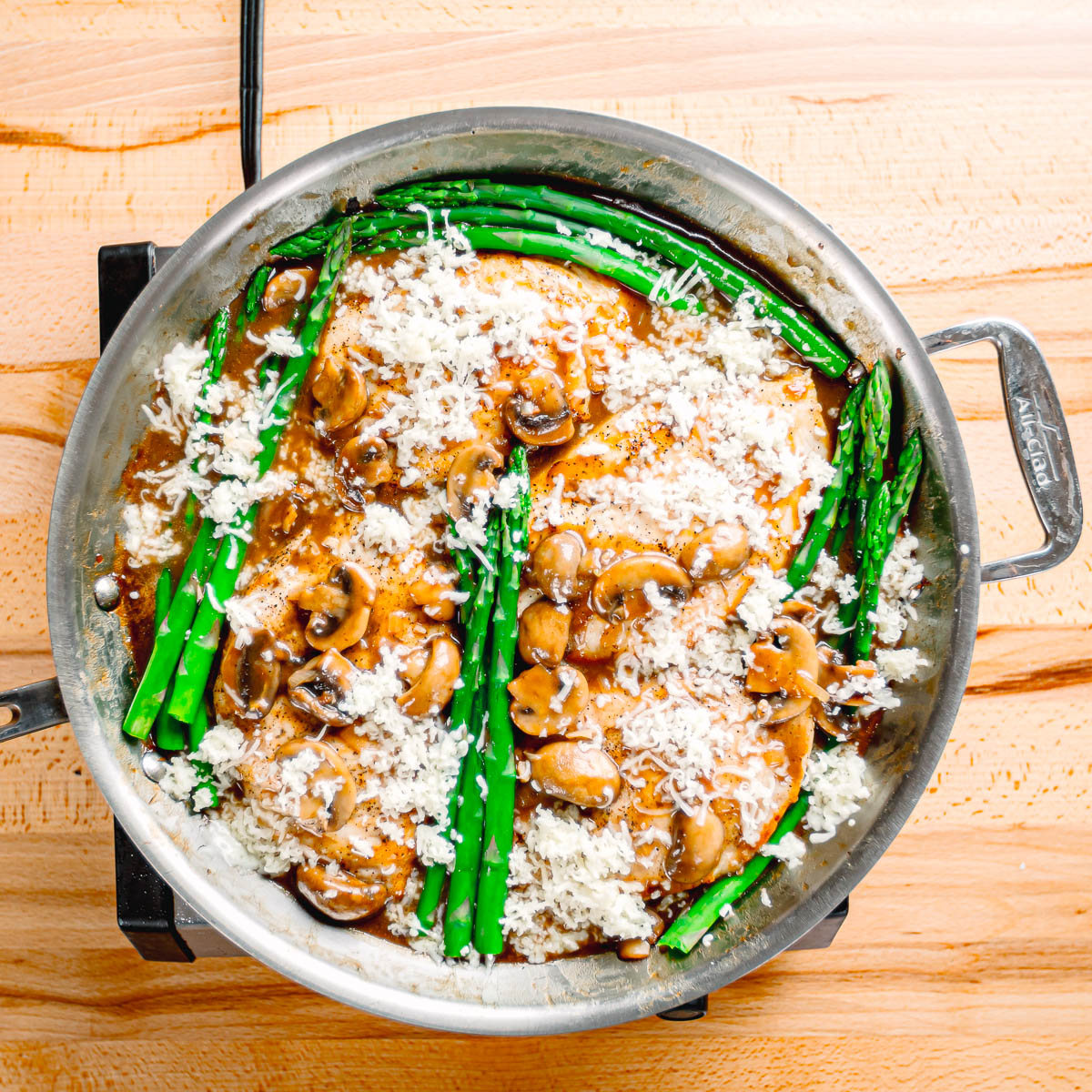chicken with asparagus and madeira sauce. 