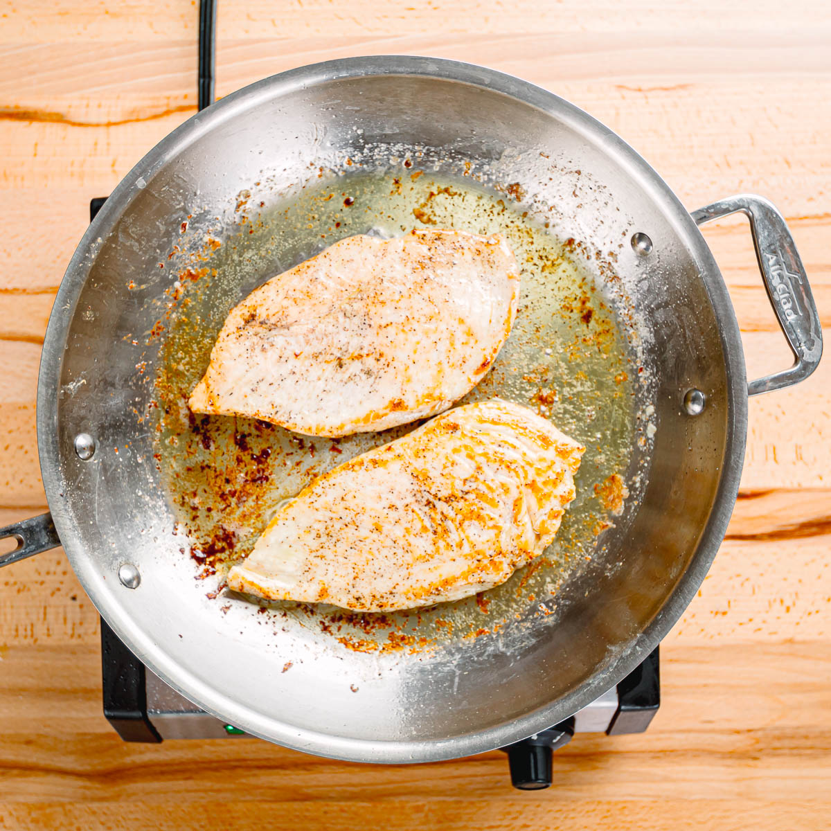 pan searing chicken.