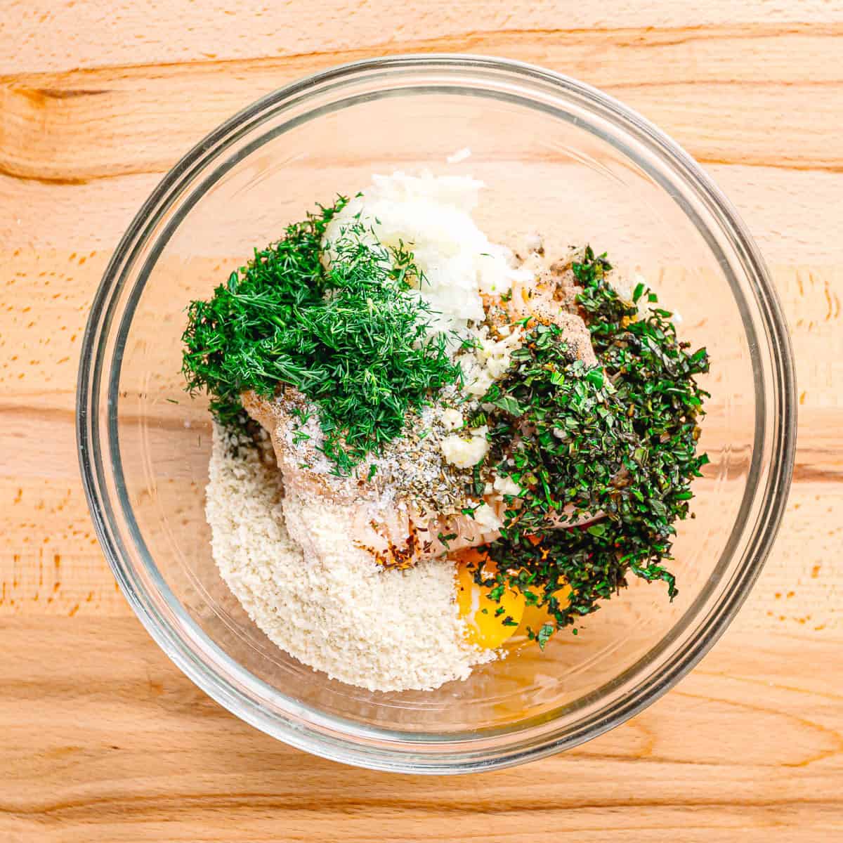 mixing ingredients for the meatballs.