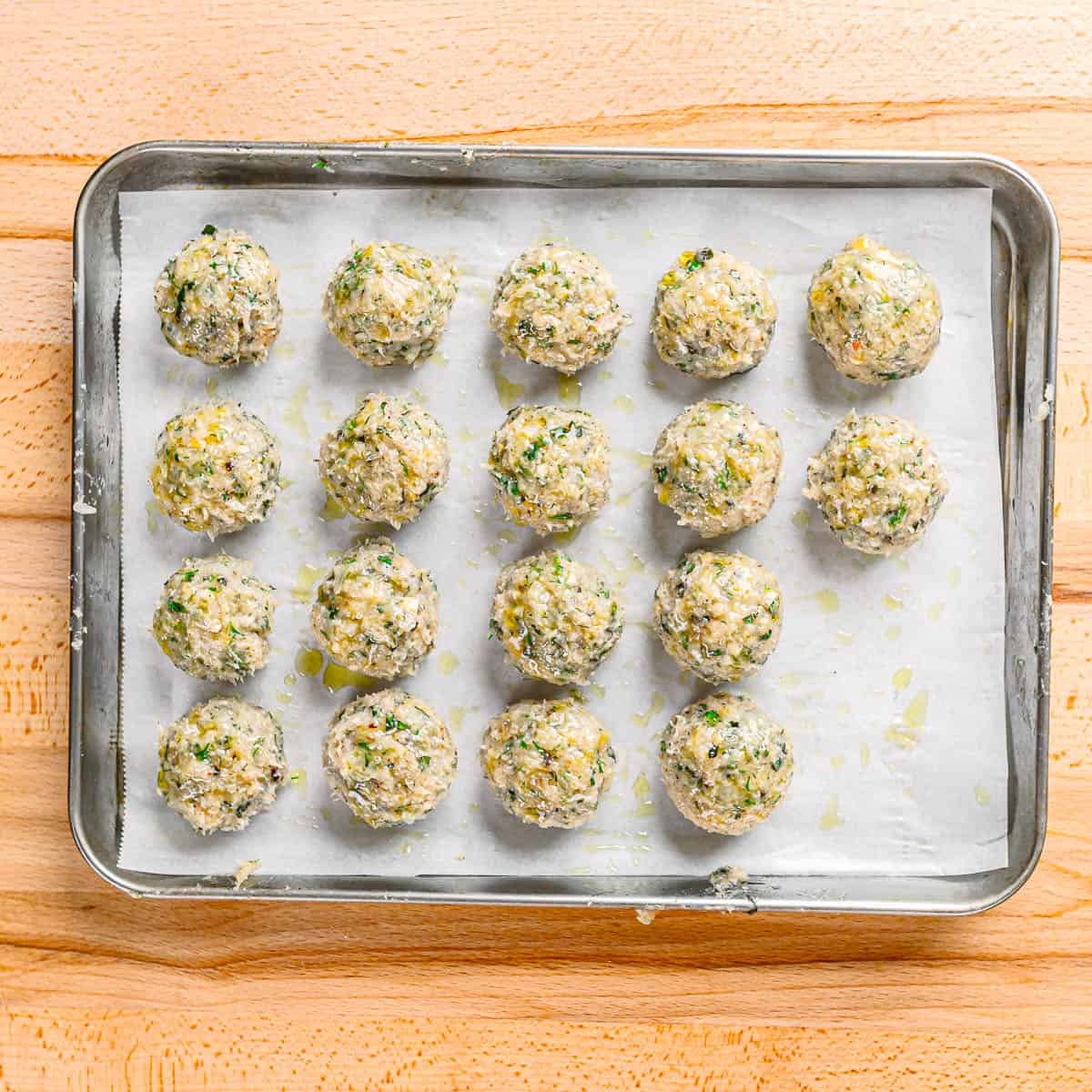 baking greek chicken meatballs. 