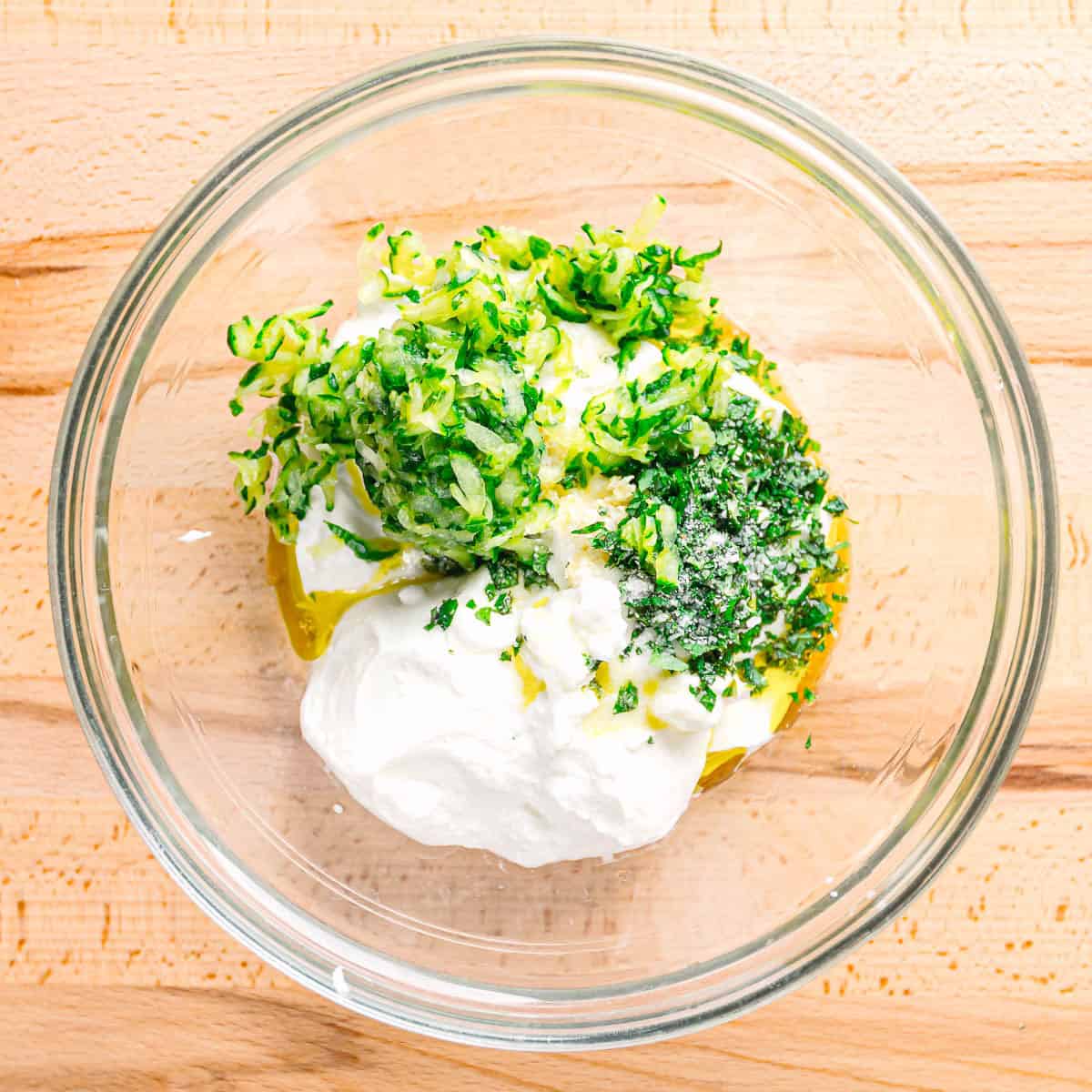 Mix the tzatziki ingredients in a bowl. 