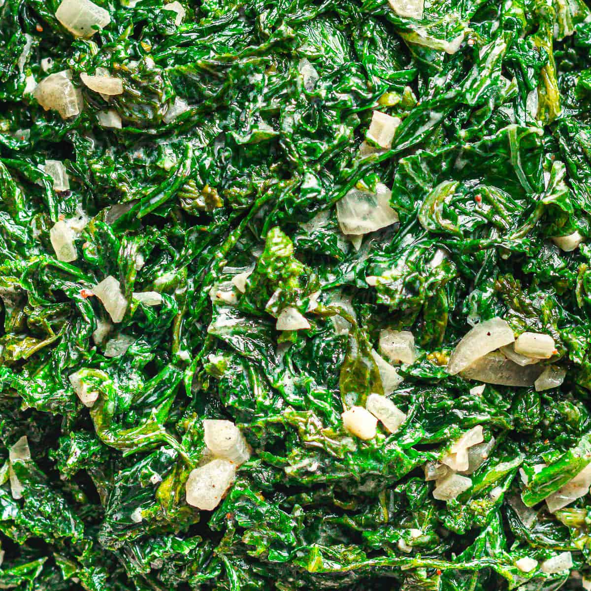 Creamed mustard greens recipe with sautéed shallots and a cream sauce. 