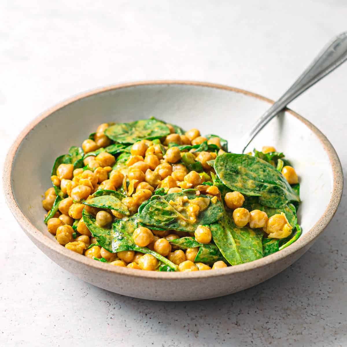 Garbanzo beans with spinach salad.