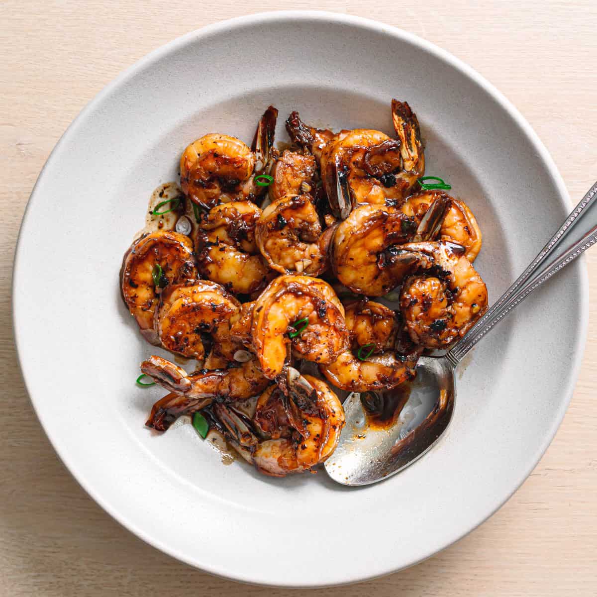 Honey garlic shrimp in ceramic bowl with glossy sauce easy shrimp recipe dinner.