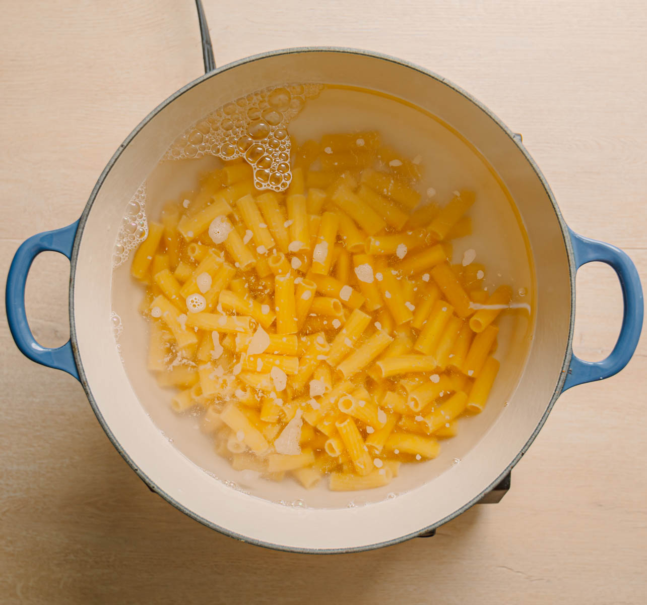 rigatoni pasta boiling in salted water until al dente for Boursin tomato pasta recipe.