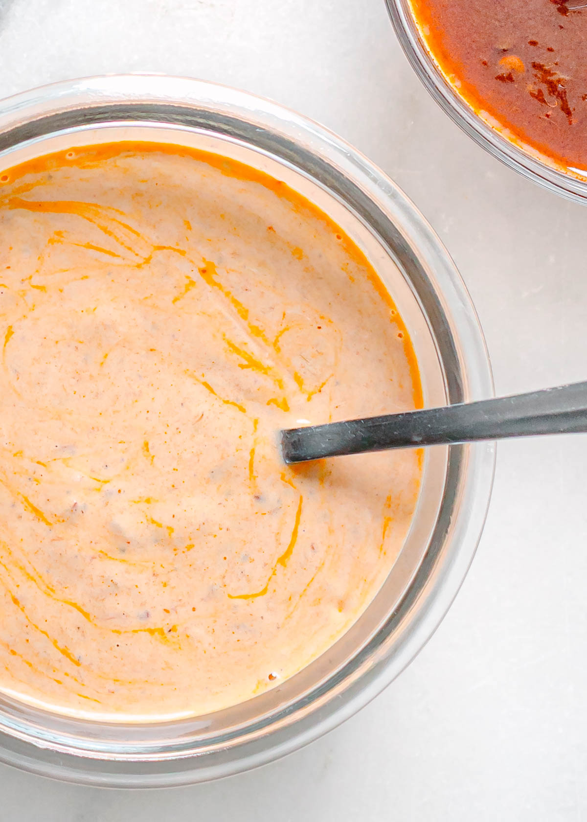 Close up of creamy chipotle sauce texture in a bowl.